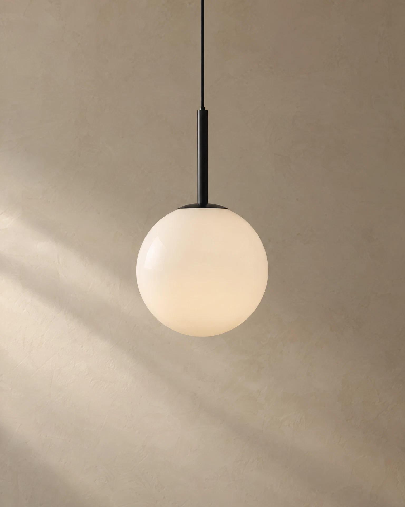 Orbit Pendant, Opal glass + blackened steel